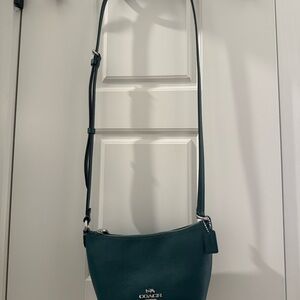 COACH Zip Top Crossbody Bag
- CW336 Silver/Emerald Green